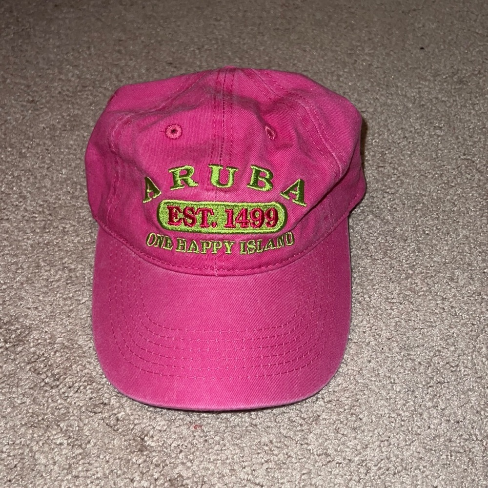 BRAND NEW pick and green hat from Aruba